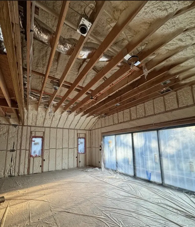 Interior walls and ceiling insulated with spray foam during new construction in Rolla